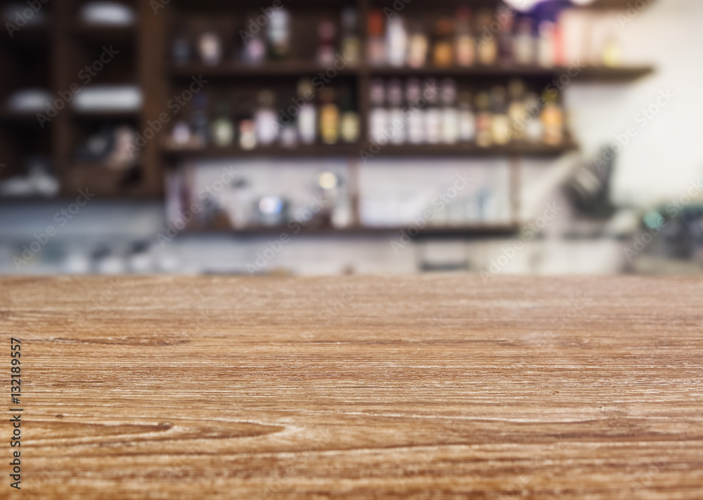 Table top Counter with Blurred Bar Shelf bottles Restaurant cafe background