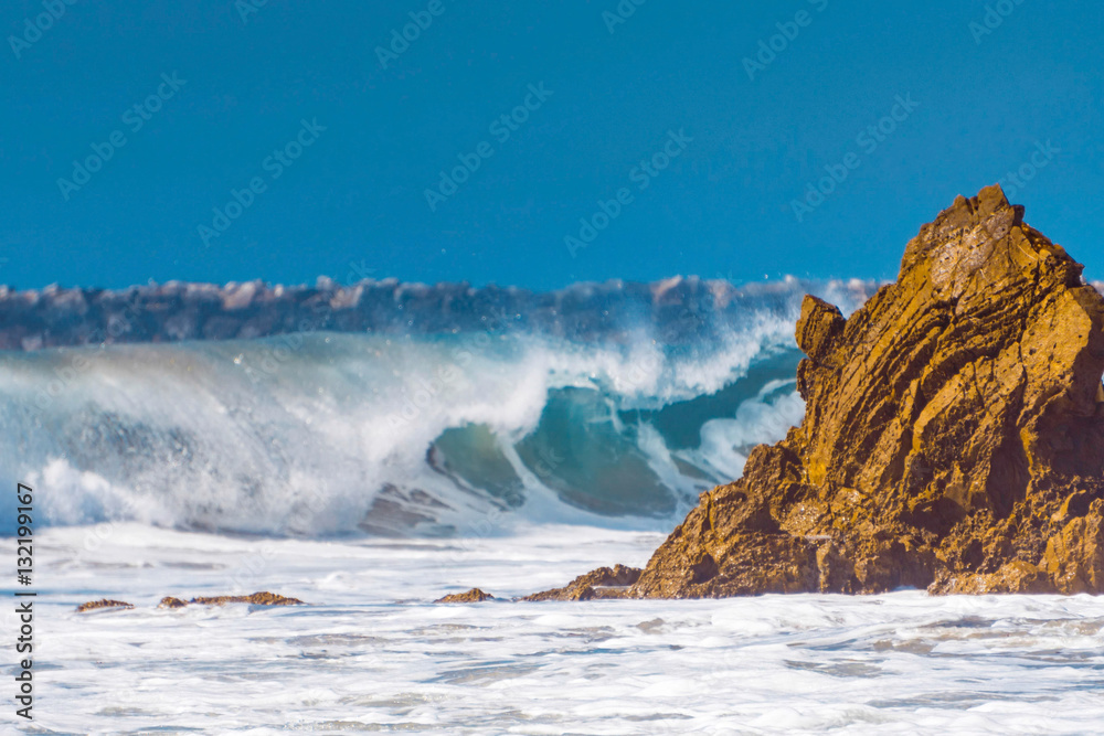 Waves breaking on the rocks Waves breaking on the rocks
