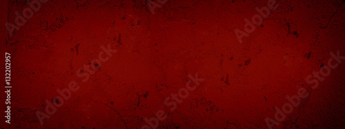 Dark red abstract textured background cracked plaster. Texture red paint cracked wall. Background Plaster Wall Texture Red Valentine's Day Celebration