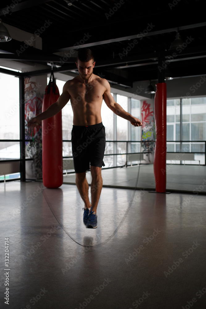 Naklejka premium Portrait of athlete with rope