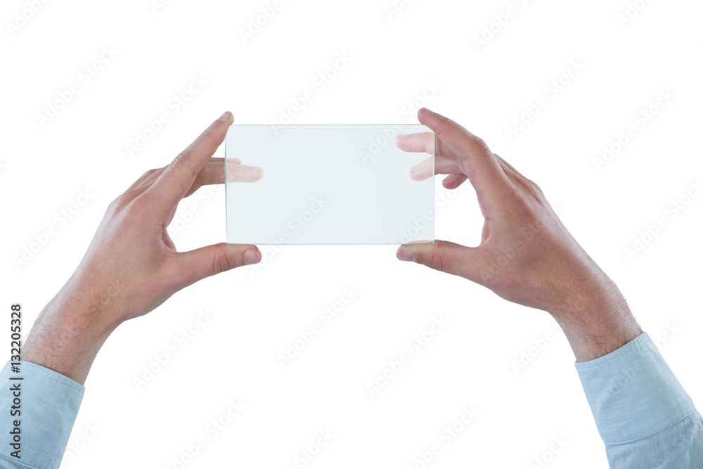 Man pretending to be using futuristic mobile phone Man pretending to be using futuristic mobile phone