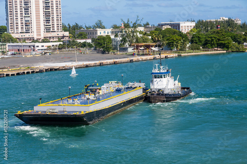 Tugboat Pushing Fuel Barge.