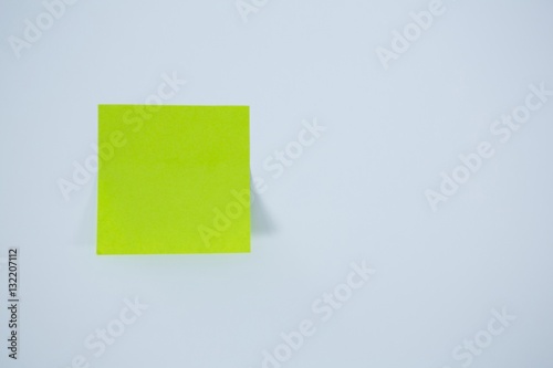 Close-up of green adhesive note