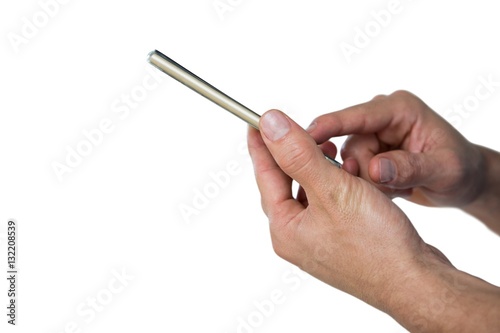Hand using mobile phone