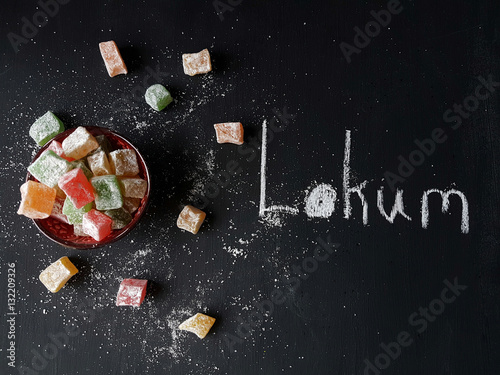 Turkish delight lokum on a blackboard background photo