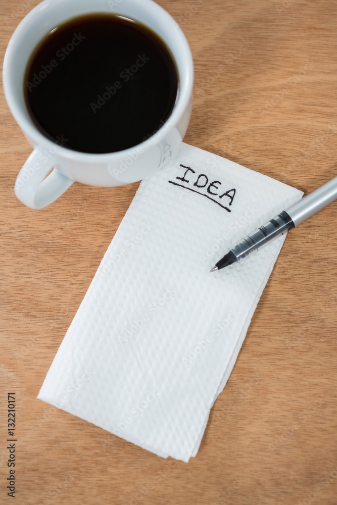 Black coffee with idea written on tissue paper Black coffee with idea written on tissue paper