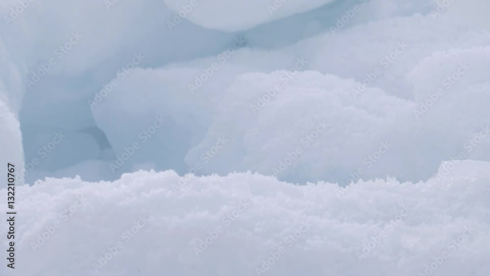 Dirty ice chunk in frozen sea. Dolly shot.
Dirty ice chunk in frozen sea. Dolly shot.