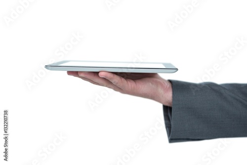 Hand of man holding a digital tablet