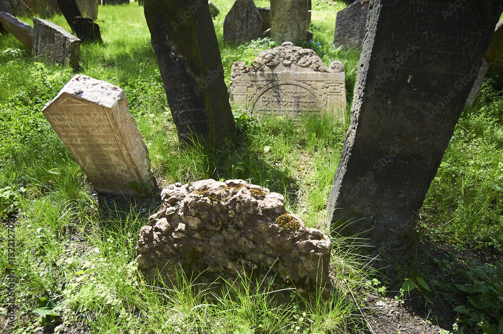 Tombstones on Old Jewish Cemetery in the Jewish Quarter in Prague.There are about 12000 tombstones presently visible Tombstones on Old Jewish Cemetery in the Jewish Quarter in Prague.There are about 12000 tombstones presently visible