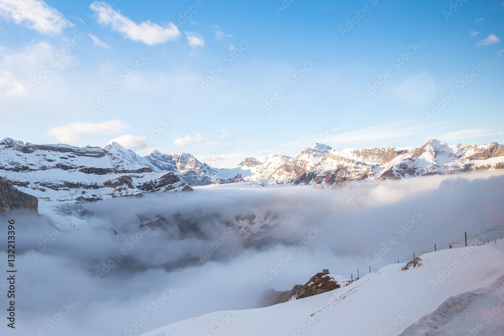 Amazing View from Jungfraujoch Train in winter scenery - Beautiful Ice mountain with blue sky