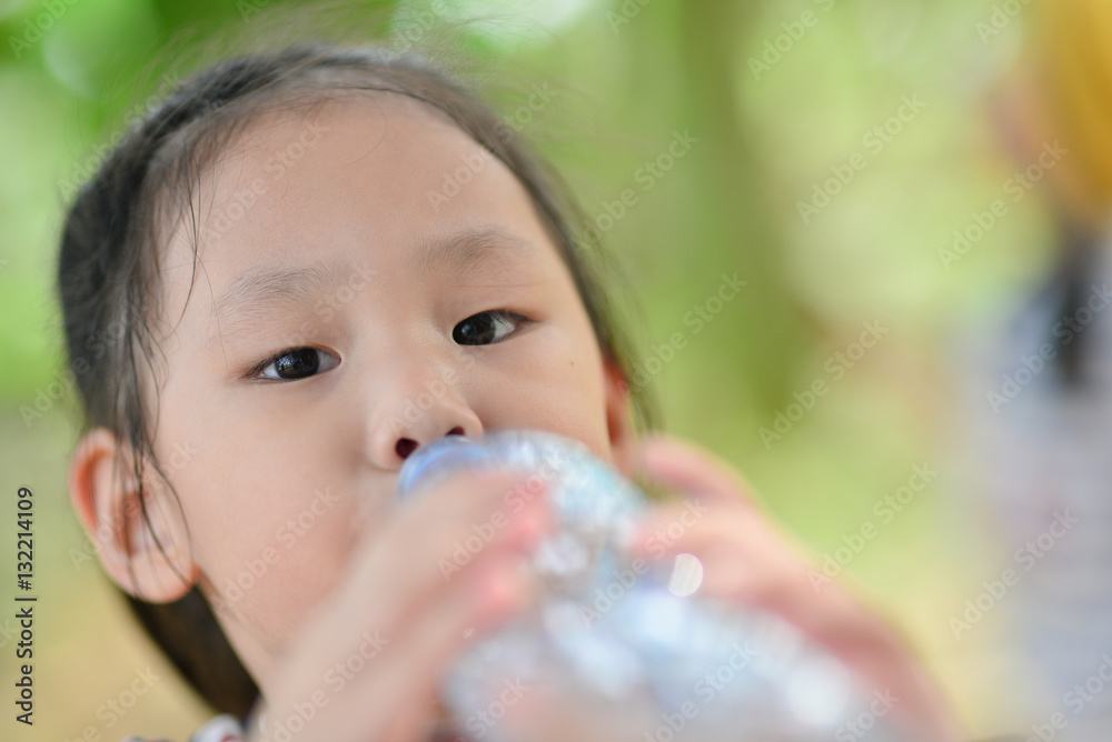 little girl drinks mineral water little girl drinks mineral water