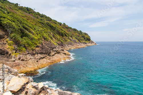 beautiful view, waves crashing into the rocks and mountain