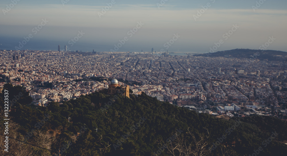 Panoramic mountain landscape in a city Barcelona. Europa, Barcelona, Spain. Old Building in Barcelona, Spain. Top view of the city. Barselona panorama