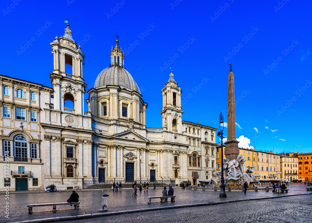 Church Sant Agnese in Agone and Fountain of the four Rivers with Egyptian obelisk on Piazza Navona in Rome, Italy