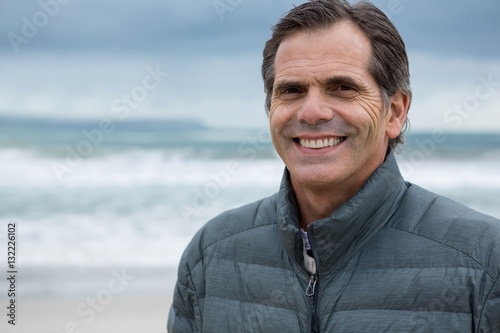 Portrait of smiling man on beach