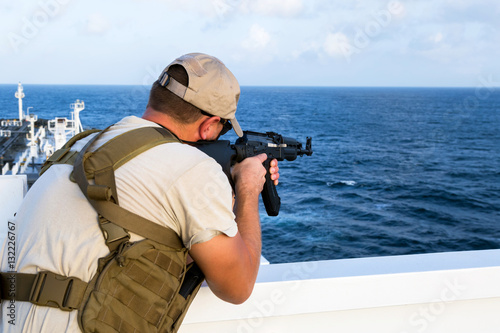 Armed guard on board sea going vessel in aden gulf photo