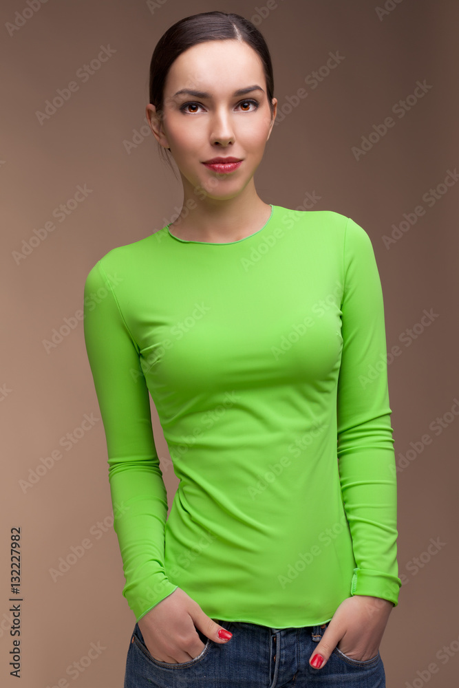 Obraz premium Young beautiful girl . more outfits in photo set
