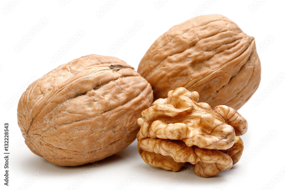 Whole walnut and half walnut piece. Whole walnut and half walnut piece.