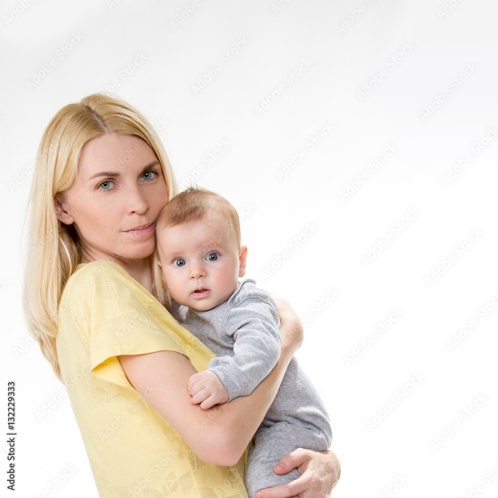 blond caucasian mother holding cute baby blond caucasian mother holding cute baby