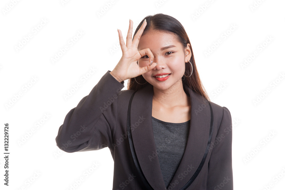 Beautiful young Asian woman show OK sign over her eye. Beautiful young Asian woman show OK sign over her eye.