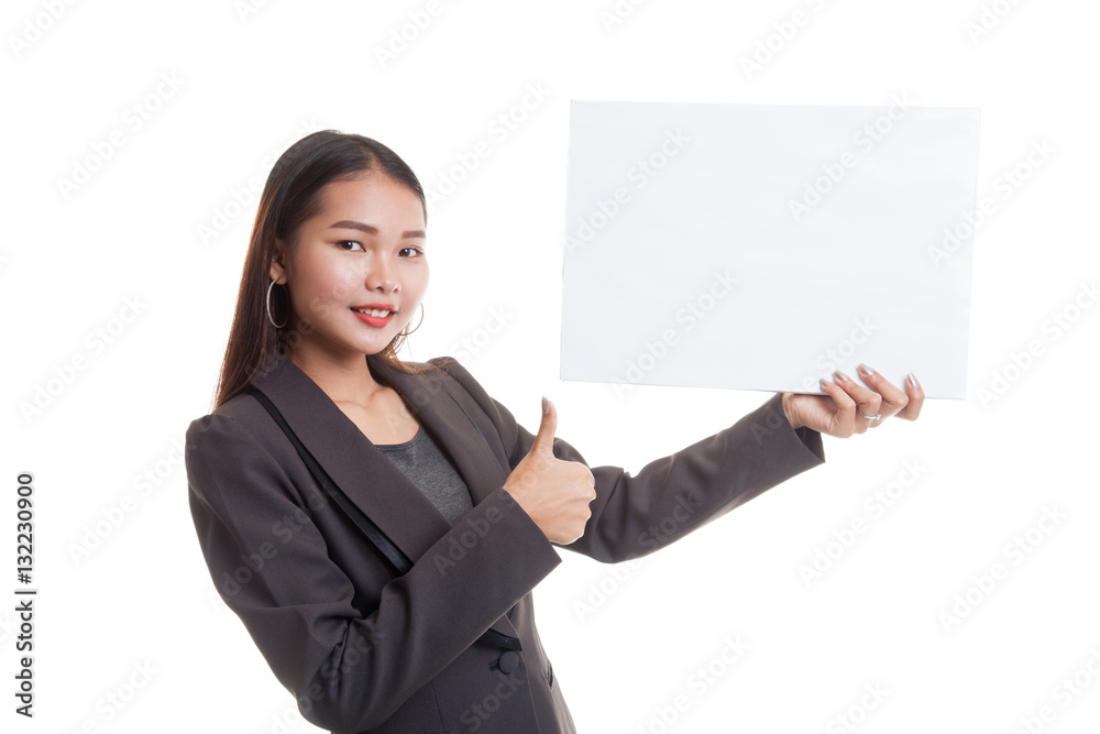 Young Asian business woman show thumbs up with white blank sign Young Asian business woman show thumbs up with white blank sign