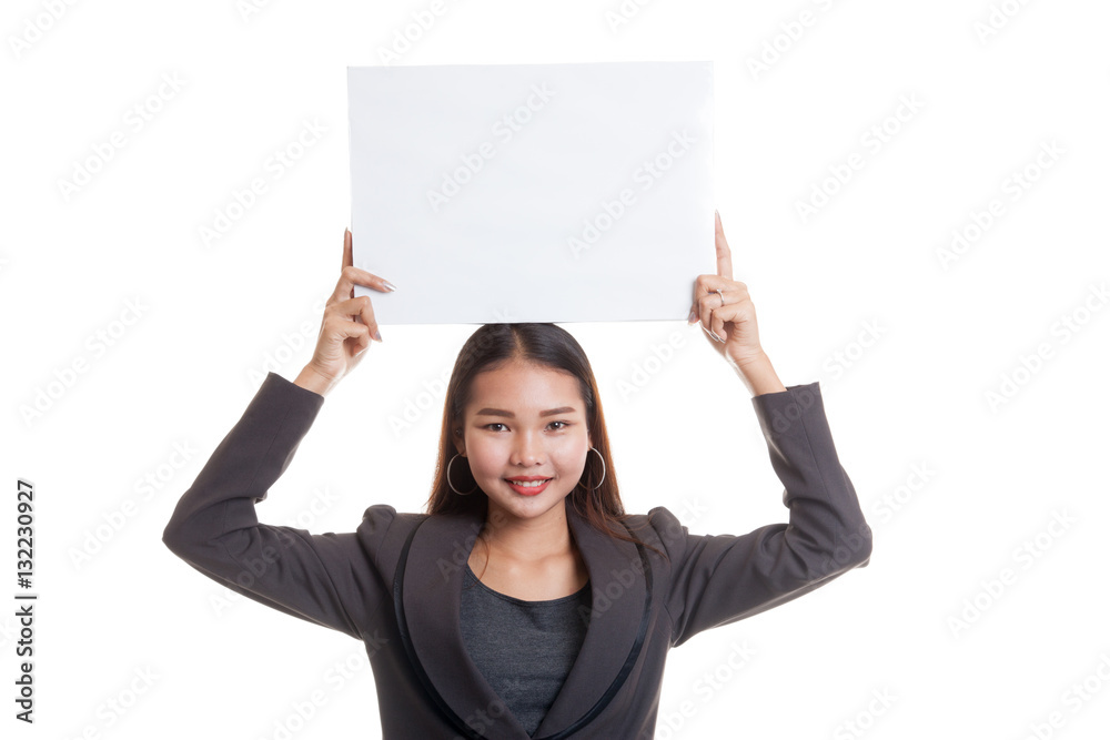 Young Asian business woman with white blank sign. Young Asian business woman with white blank sign.