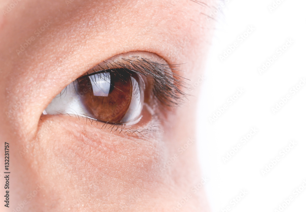 Obraz premium Macro shot of man's eye with visible blood vessels.