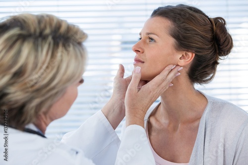Doctor examining a patient