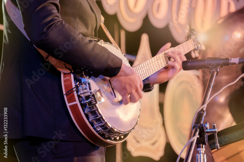 Photos Jazz / View of musician playing banjo in concert at night