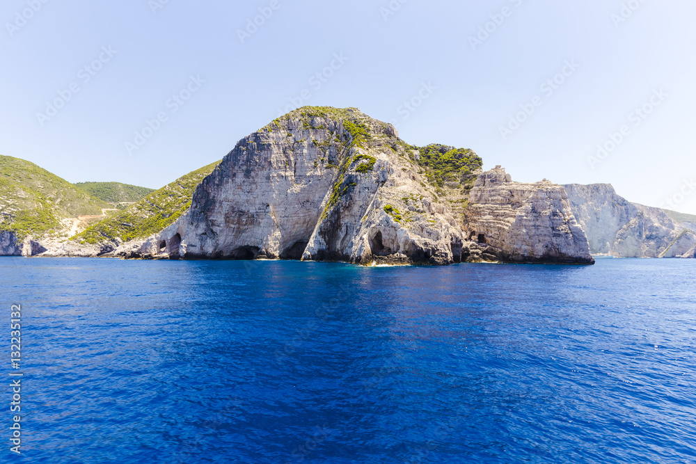 Cruise around Zakynthos, views from the sea on the island, Greece, background.