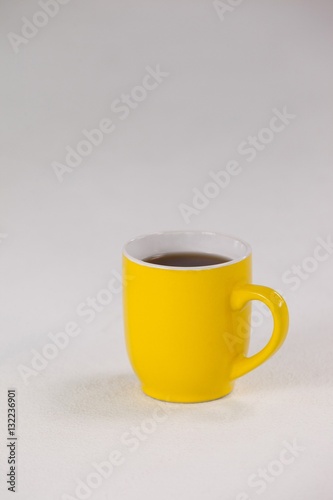 Yellow coffee cup