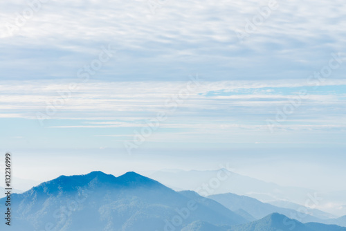 Layers of mountain landscape foggy. © tirachard