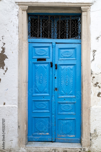 Ornate Tunisian door, traditional architectural detail © EnginKorkmaz