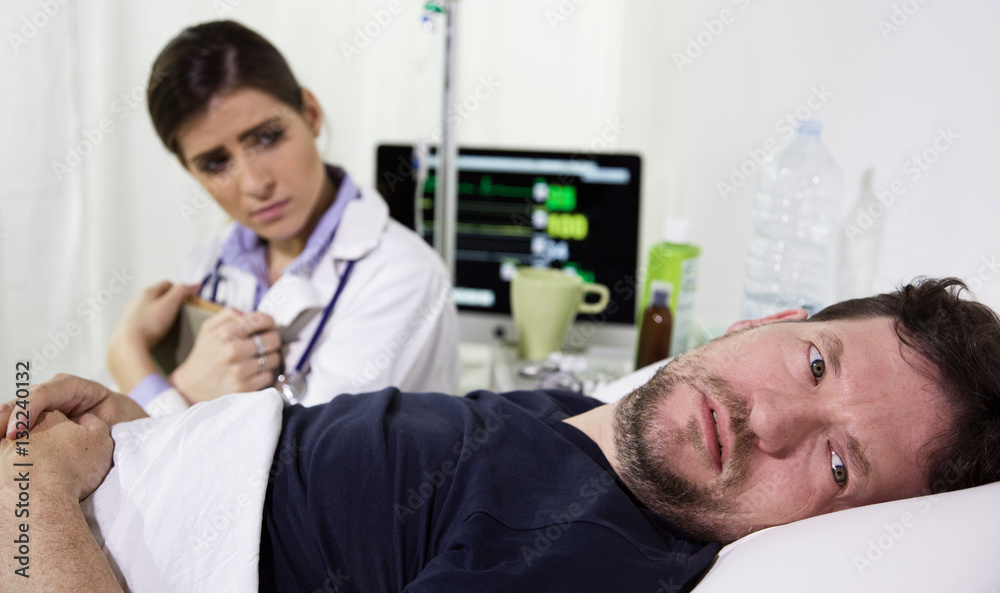 Man in hospital bed scared after receiving the diagnostic test results