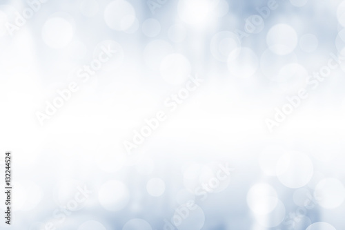 Blue bokeh. Blurred light on blue background.