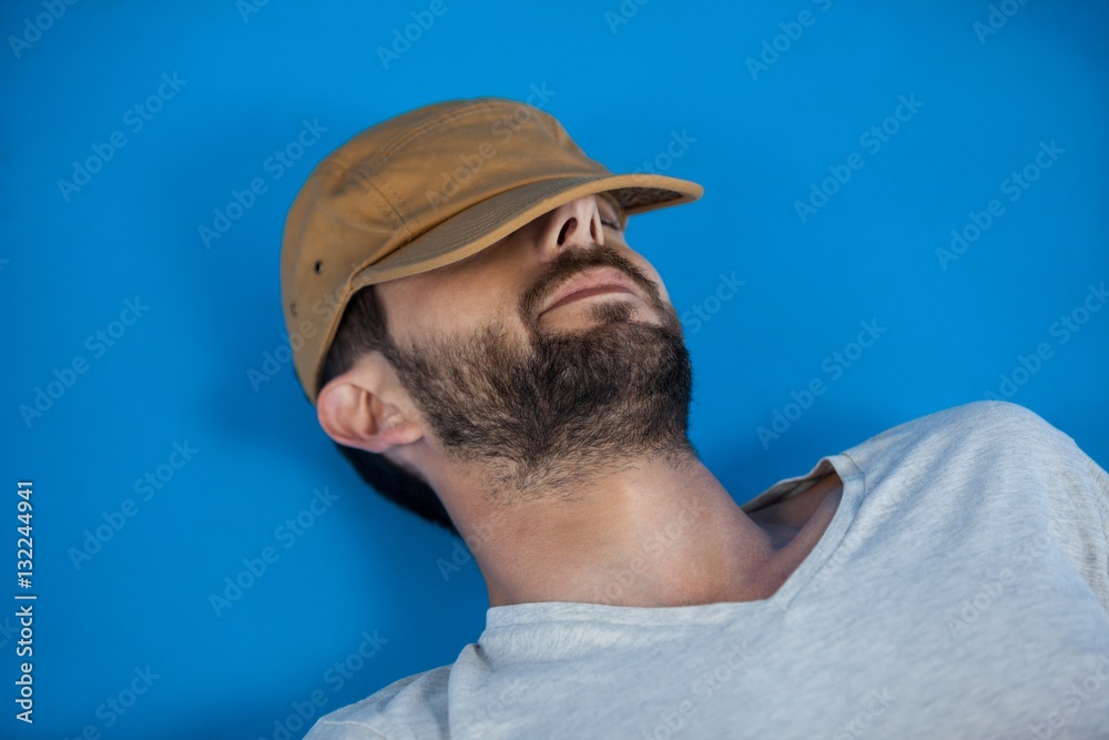 Man in cap relaxing Man in cap relaxing