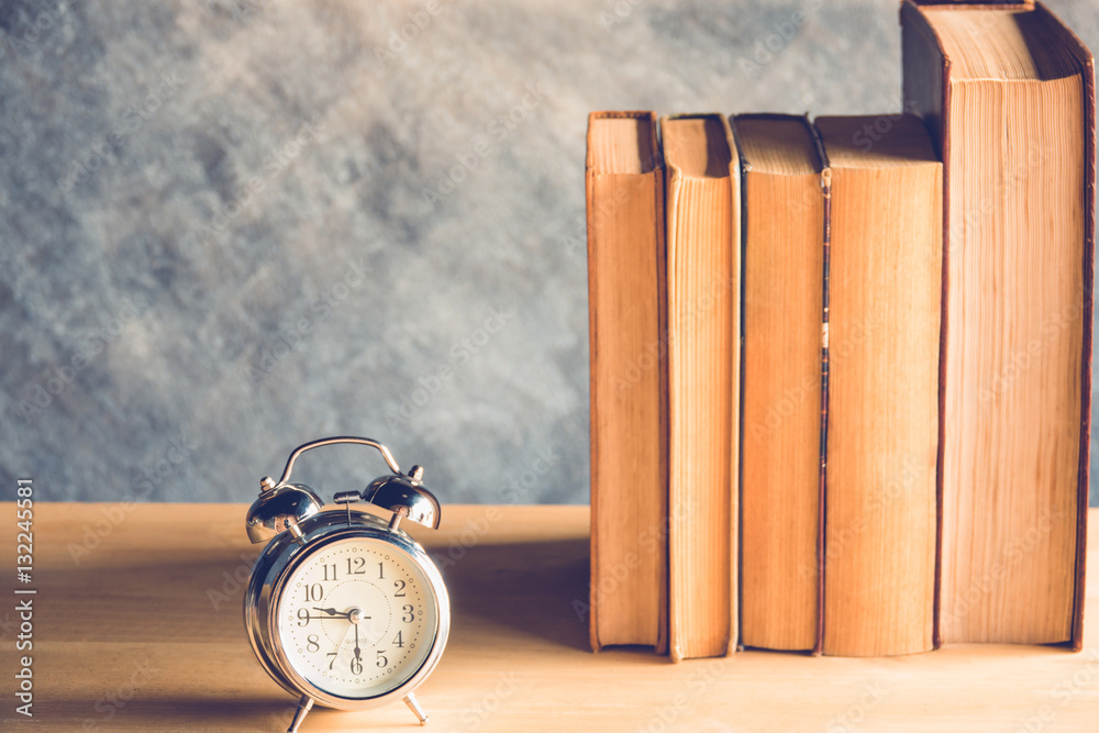 clock and book clock and book