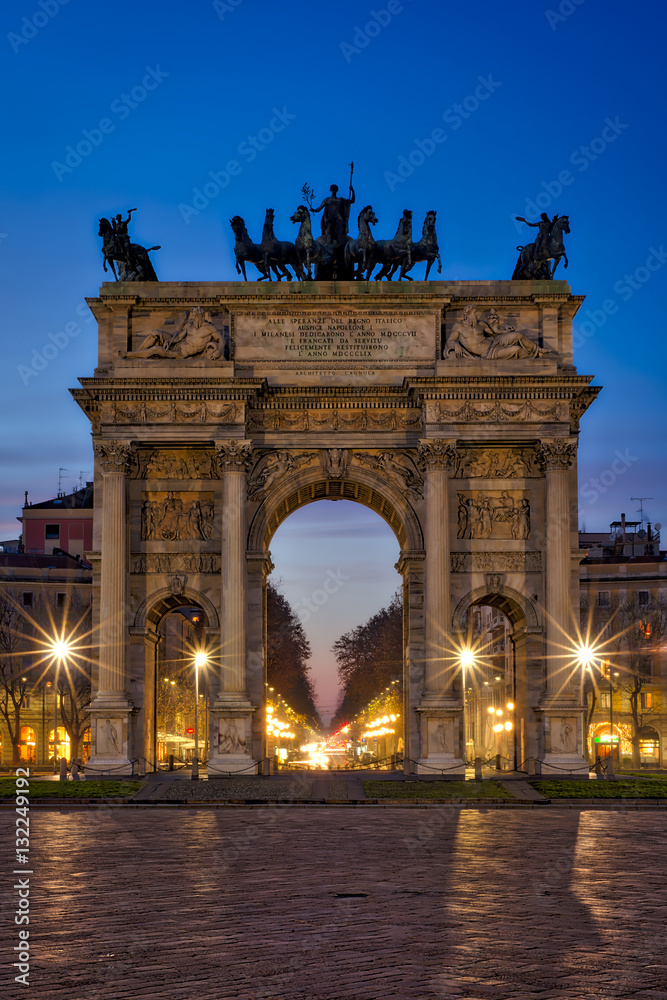 Night view of Arch of Peace (Arco della Pace) in Sempione Park, Milan, Italy.