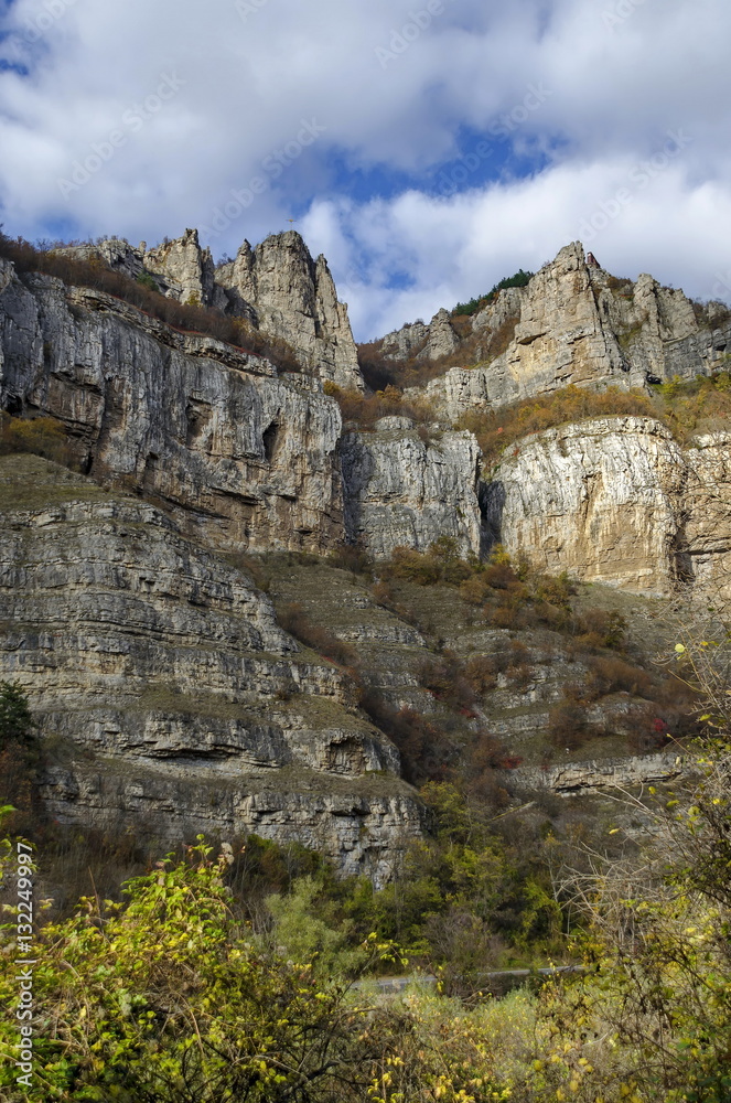 Two high top of Lakatnik rocks with monument and cross,  Iskar river defile, Sofia province, Bulgaria 