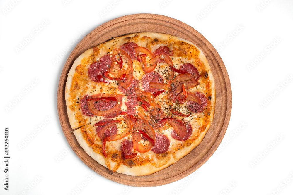 Big appetizing pizza on a wooden tablet