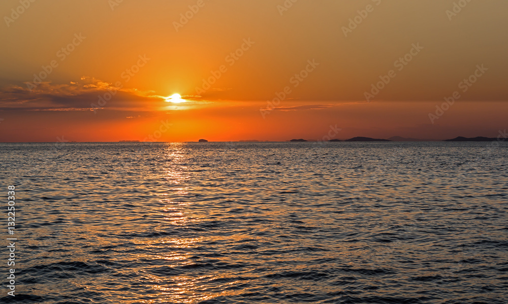 Fototapeta premium Sunset over the sea.