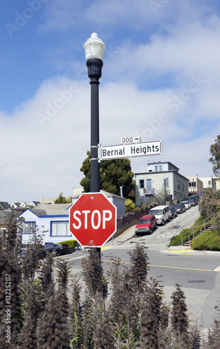 Картината върху платно Intersection in San Francisco's Bernal Heights neighborhood with fog rolling in