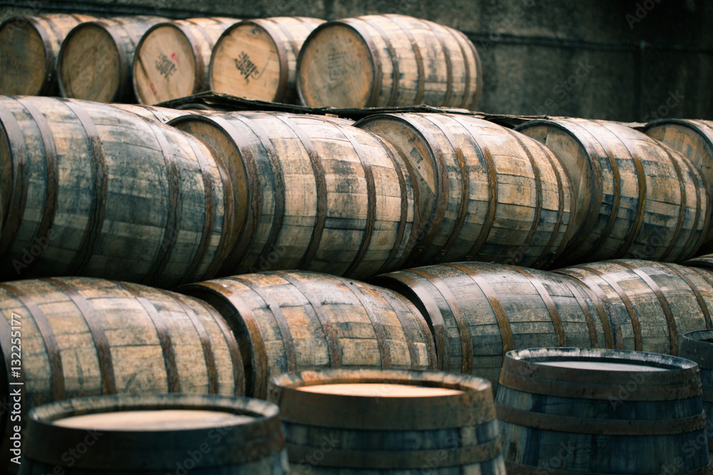 Whisky barrels full of whiskey in Scottish traditional distiller Whisky barrels full of whiskey in Scottish traditional distiller