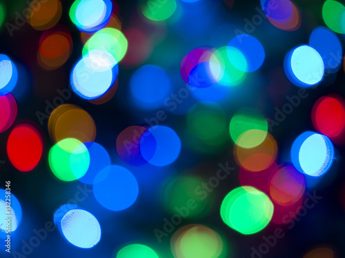 Colorful Christmas lights bokhe on black