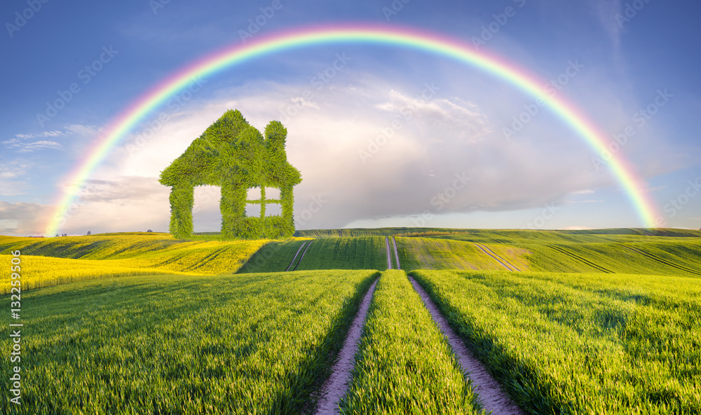 Naklejka premium concept green house built of leaves standing on a green, ecologi