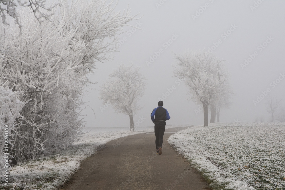 jogging in winter during fog