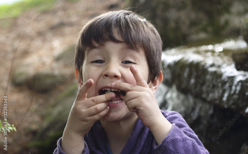 kid joking with stones kid joking with stones