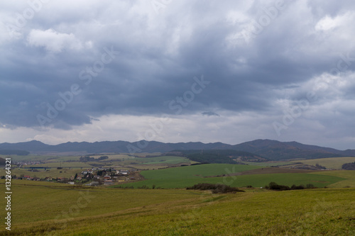 Clouds and sunrays over the meadow. Slovakia © Valeria