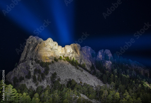 Mount Rushmore National Memorial at night with stars