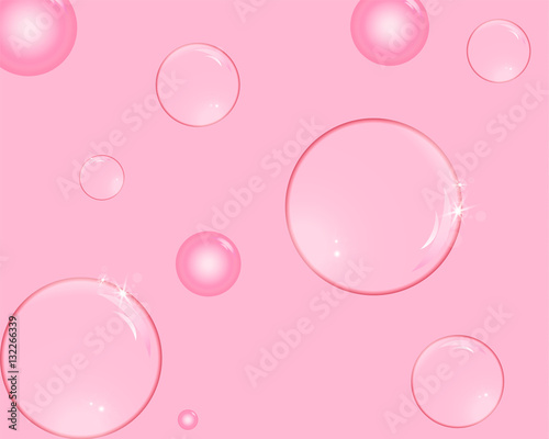 Soap bubbles with reflections pink background